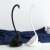 Black and white swan shaped soup ladles with stands, kitchen utensils
