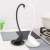 Black and white swan shaped soup ladles with stands, kitchen utensils