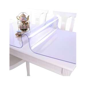 Protectie transparentă din silicon pentru masă, 200x80 cm, grosime 1,2 mm, aspect de sticlă, pe o masă cu ceainic și cești - ABYZ
