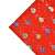 Red Christmas wrapping paper with blue and yellow ornaments