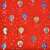 Red Christmas wrapping paper with blue and yellow ornaments