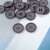 Szürke műanyag gombok négy lyukkal, 20,7 mm átmérő