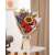 Rowood wooden flower bouquet 3D puzzle, assembled, on a table in a living room
