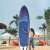 Woman paddling on a Hitabay DEEP SEA inflatable SUP board on the beach