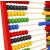 Close-up of Fa Számoló colorful beads on a wooden abacus