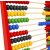 Close-up of Fa Számoló colorful beads on a wooden abacus