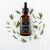 Mercaton 10ml Cinnamon Essential Oil bottle with rosemary sprigs