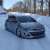 Opel Astra J 2009-2020 mit Aftermarket-Felgen und Seitenschwellern