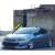 Opel Astra J 2009-2020 mit Aftermarket-Felgen und Seitenschwellern