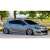 Opel Astra J 2009-2020 mit Aftermarket-Felgen und Seitenschwellern