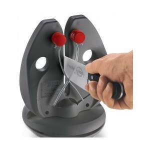 Knife sharpener with a base, a hand is sharpening a knife on it - Knife Sharpener