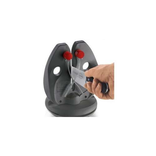 Knife sharpener with a base, a hand is sharpening a knife on it