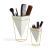 Umbra Trigg planter set used as a makeup brush and cosmetic organizer.