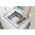 Close-up of the Candy TCA284TM5 top loading washing machine drum and detergent dispenser