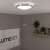 Avide Pandora LED ceiling lamp, warm white light, installed in a room