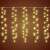 LED curtain lights hanging from a white wire