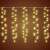 LED curtain lights hanging from a white wire