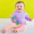 Happy baby playing with Oball Rattle Teether, Infant Toy