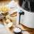 Camry CR 6313 Air Fryer Oven, white, close-up of handle