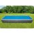 Intex rectangular pool with solar cover in garden setting