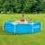 Intex Metal Frame Pool, 244x51cm, blue, round, above ground, in a garden