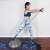 Woman doing a side exercise on a gray balance ball