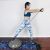 Woman exercising with resistance bands on Springos Balance Trainer