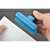Hand holding blue plastic bag sealer clip, Flippy brand, sealing paper