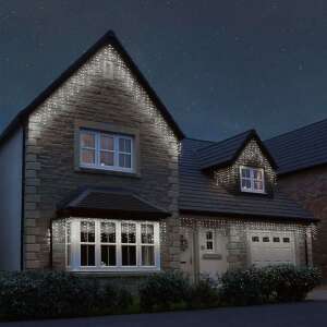 Flippy 17m LED icicle lights illuminating a house at night - Home & Garden