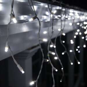 Flippy 35m 275 LED icicle lights hanging from a gutter - Christmas