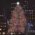 Large Christmas tree illuminated with Springos Cl1009 1000 LED lights in a city