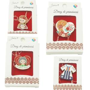Assortment of Jolie Drag de primavara brooches in boxes, featuring various designs including a girl, a heart with flowers, and a traditional Romanian dress - Brooch