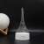 Flippy 3D Eiffel Tower LED lamp with remote control, showing the lamp on a table