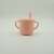 Pink silicone baby cup with straw and handles