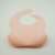 Pink silicone bib with food catcher