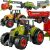 Close-up of 6-piece toy farm vehicle set, tractors, trailers, and attachments