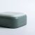 Closed green Flippy mini pill box side view
