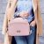 Woman carrying a Flippy pink insulated lunch bag