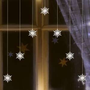 Home KAF7WW snowflake light curtain with 7 warm white LEDs hanging in a window - Home String Light