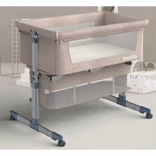 Pepita beige bedside crib in a modern nursery setting