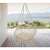 Pepita macrame hanging chair on patio, beige color, relaxing outdoors