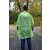 BSP Guard Poncho Raincoat, green color, worn by a man in a park