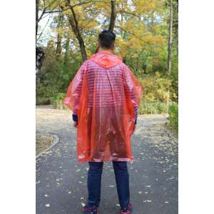 Man wearing red BSP Guard poncho raincoat in the park - Raincoat