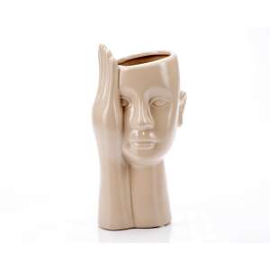 Cream ceramic vase with a human face design, perfect for adding a modern touch to your home decor - Vase