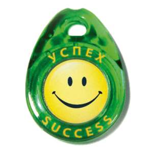 Triomed Siker Medál, green pendant with a smiley face and the words 'Success' and 'Успех' on it - Health Support Device