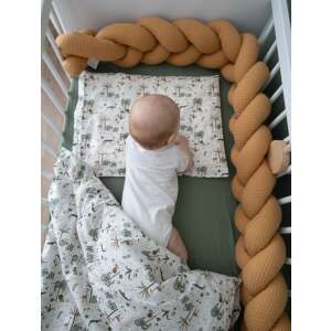 African Safari premium baby bedding set with a baby sleeping in the crib - Baby Bedding Set