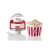 Ariete Party Time 2957.RD red and white popcorn maker with popcorn in a bowl and a measuring spoon