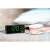 Adler Europe AD1121 alarm clock radio with large green LED display, black color, on a nightstand