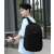 Man wearing Trizand 38L black backpack