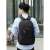 Man wearing Trizand 38L black backpack